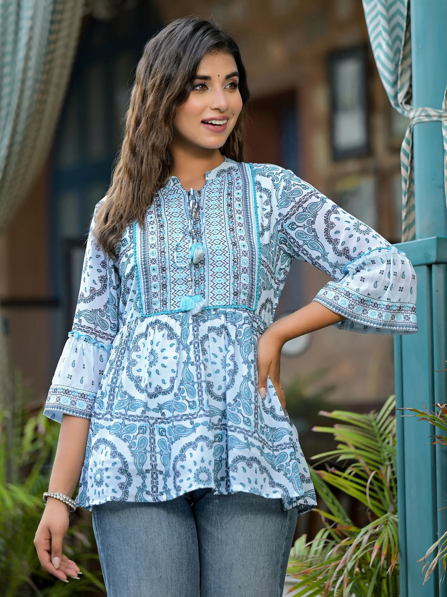 Jashvi Sky Blue Ethnic Motif Printed Georgette Lacy Tunic With Tassels & Sequins