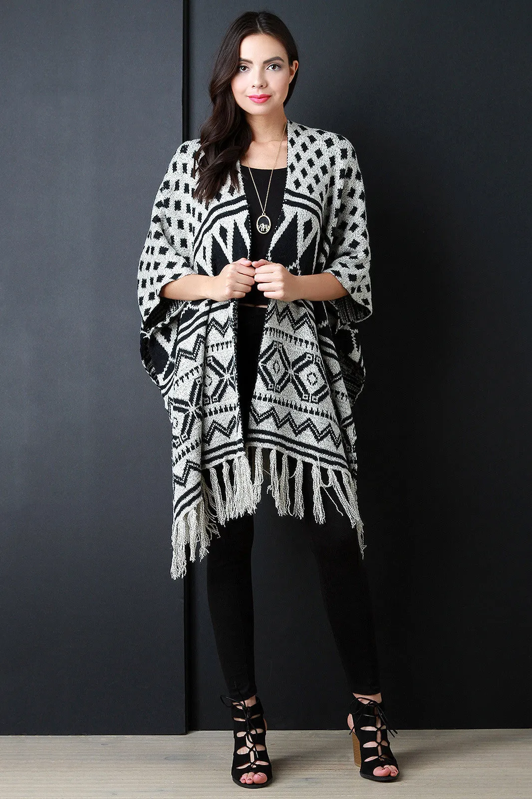 Loose Knit Multipattern Fringe Tassel Hem Poncho